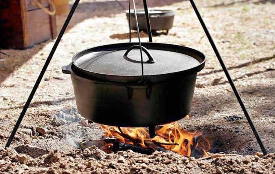 types of dutch ovens cast iron dutch oven on tripod over camp fire