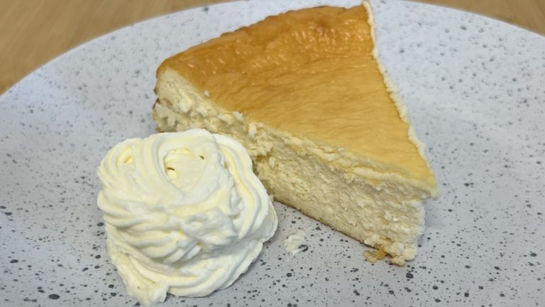 baked carnivore cheesecake with fresh whipped cream