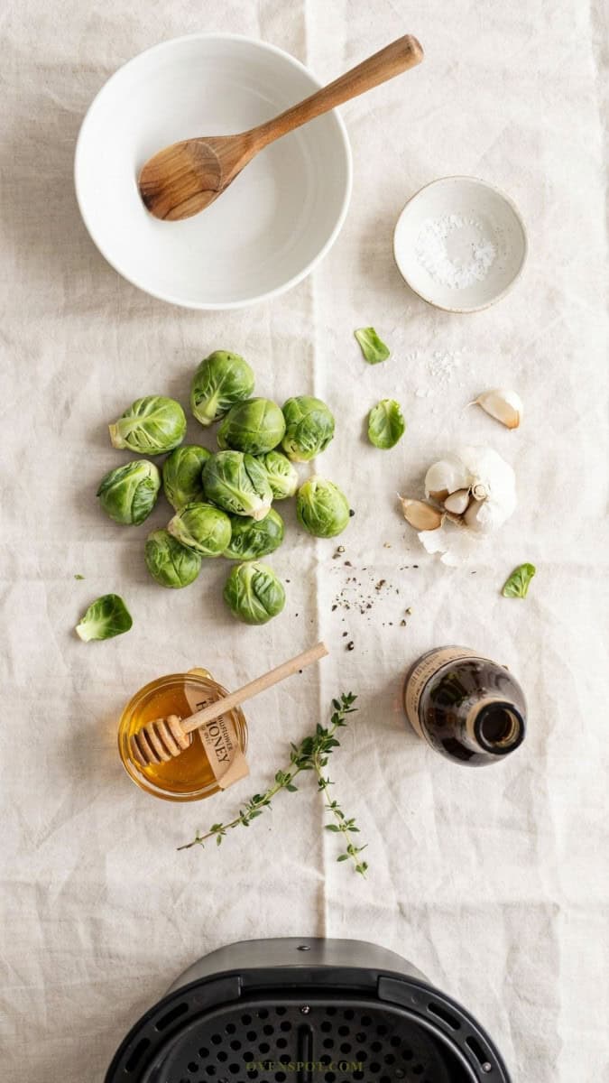 ingredients and tools to make crispy air fryer brussels sprouts